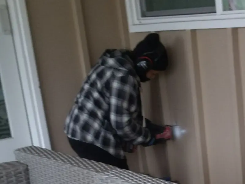 Professional electrician installing an exterior outlet in Macedonia